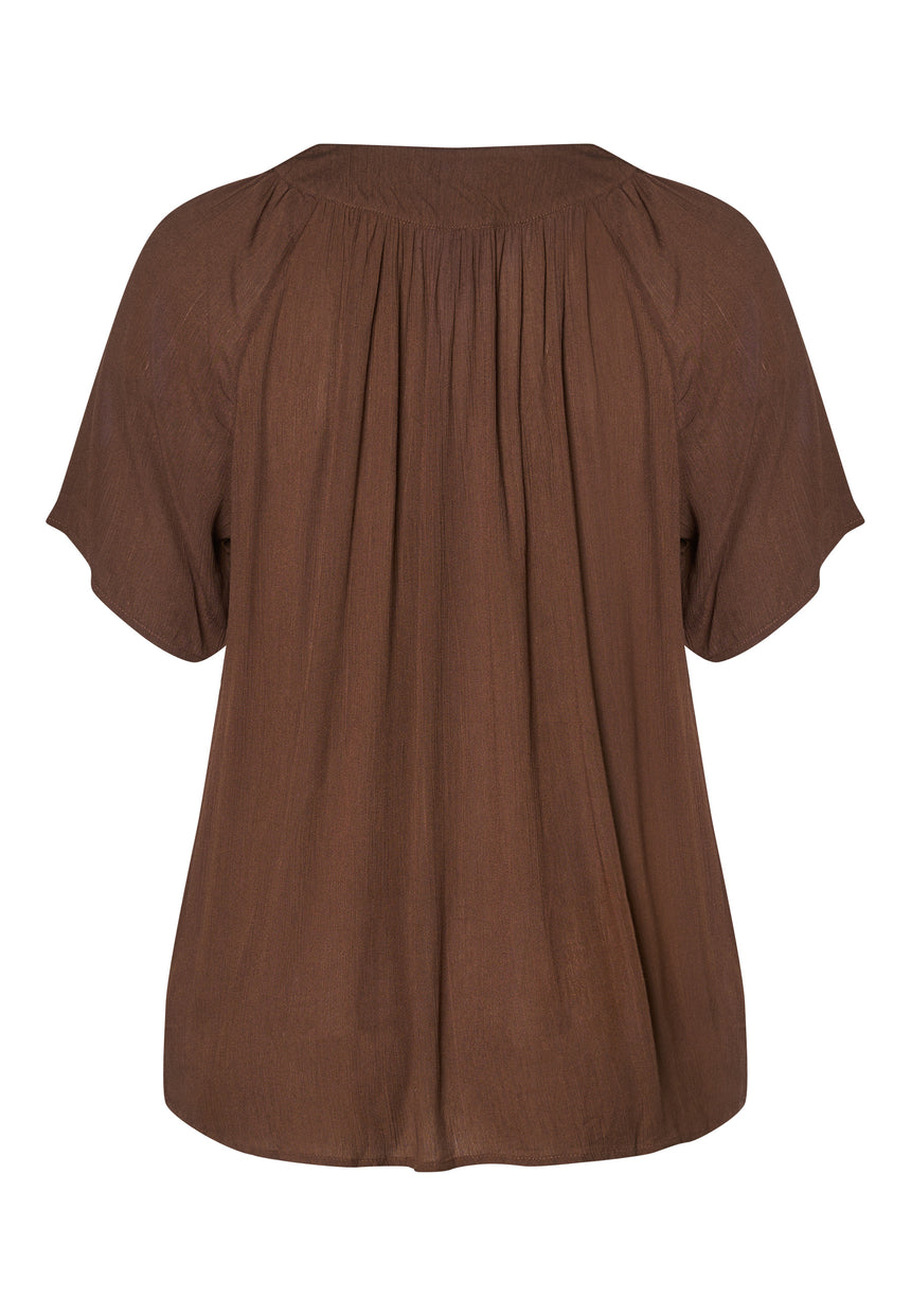 Tuniek, ADIA